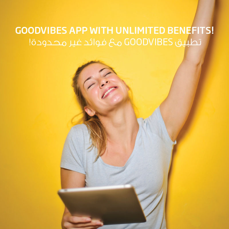 happy woman using Fitness first Good Vibes application happy woman using Fitness first Good Vibes application
