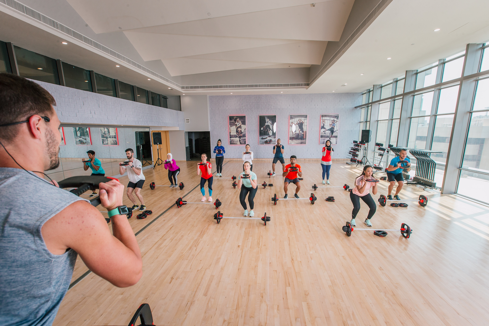 Classes cover image Fitness First group exercise in workout studio